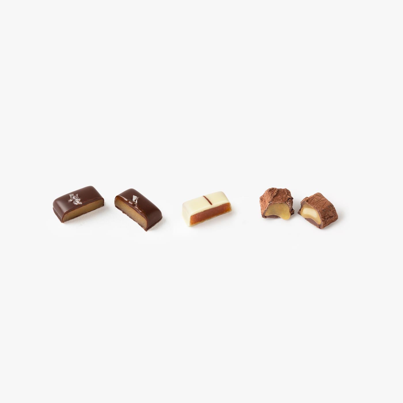 Assortment of chocolate covered caramels in a gift box